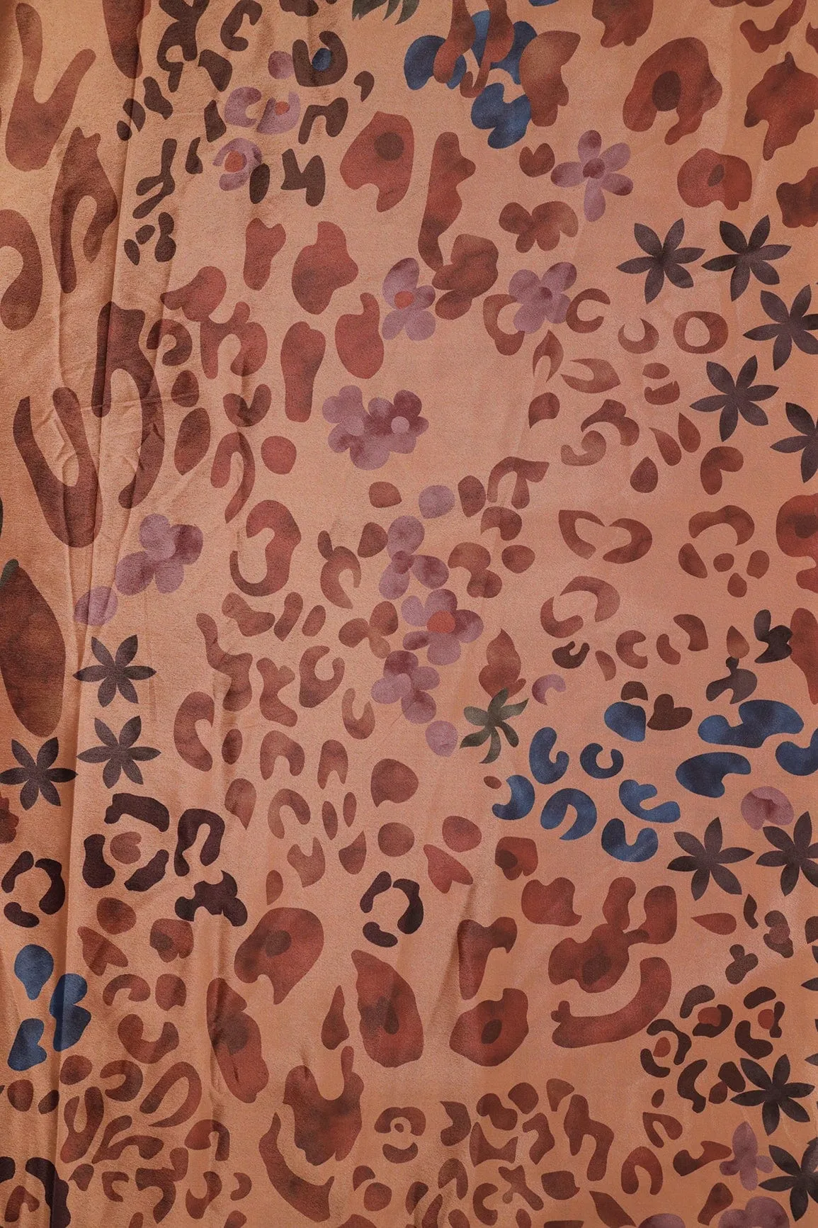 Brown And Blue Abstract Print On Pastel Orange Crepe Fabric