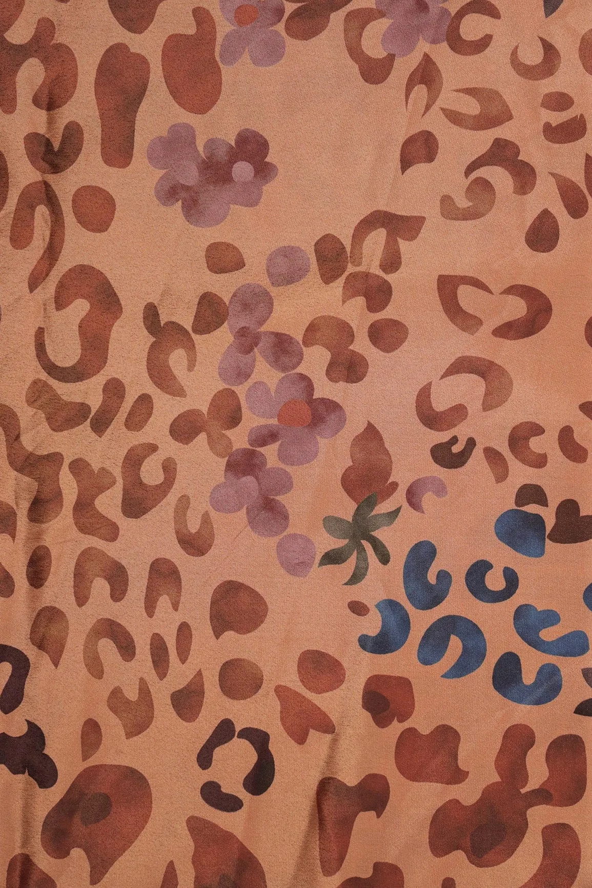 Brown And Blue Abstract Print On Pastel Orange Crepe Fabric